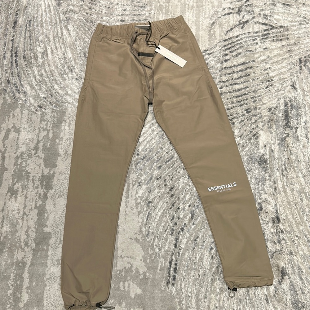New Essentials track pants with tags